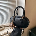 Chic black bowling handbag with lychee texture and a cute brown plush charm - With Charm / Black