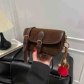 Vintage brown suede flap crossbody bag with deep brown leather trim and pompom detail - With Charm / Brown
