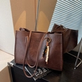 Deep brown textured leather tote bag with stylish beaded tassel and dual straps - Coffee (With Charm)