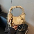 Minimalist beige ruched crescent handbag with gold chain strap and decorative beads - Off White