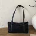 Vintage black suede baguette shoulder bag with smooth leather strap on a wooden surface - Black