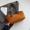 Brown vintage suede tote bag with dark leather trim shown on a classic grey blazer - Yellow Brown