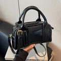 Glossy black leather Boston bag with vintage gold hardware and adjustable strap - Black