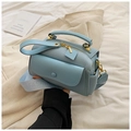 Light blue lychee texture pillow bag with fashion strap and gold hardware accents - Blue