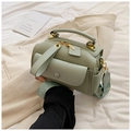 Sage green minimalist crossbody bag with textured leather and wide embossed strap - Green