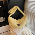 Quilted light yellow crescent shoulder bag with heart embroidery and pearl plaque - Yellow