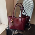 Deep red patent leather tote bag with elegant beaded pendant and slim double handles - With Charm / Burgundy