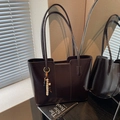 Large dark brown leather tote bag for women featuring a minimalist beaded charm accessory - With Charm / Coffee