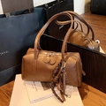 Brown vintage faux leather underarm bag with pleated texture and decorative charms - Brown with Pendant