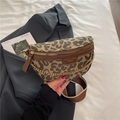Detailed macro view of leopard print crossbody bag with gold chain and wide shoulder strap - Leopard Brown