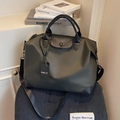 Borsa da viaggio capiente grigio scuro con corpo in nylon e manici in pelle di qualità - Nero