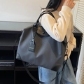 Grande borsa da viaggio nera con manici in pelle e tracolla regolabile - Grigio