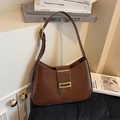 Minimalist dark brown half-moon underarm bag in glossy leather with gold metal hardware - Brown