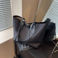 Classic black high-capacity tote bag in matte finish with long shoulder straps for daily commute - Black