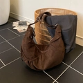 Retro deep brown suede hobo bag with a minimalist crescent shape and adjustable strap - Brown