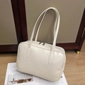 Close-up of off-white minimalist shoulder bag with smooth faux leather and zip closure - Off White
