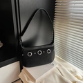Minimalist black suede underarm bag with silver rings and metal rivets detail - Black