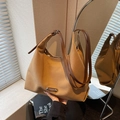 Large khaki canvas tote bag with brown leather straps and metal logo detailing - Brown