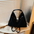 Black suede tote bag with golden rings, convertible to a backpack for daily commute - Black