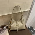 Creamy white vintage leather shoulder bag with decorative wood beads and stitching - Beige With Charm