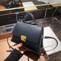 Chic black matte small square handbag with gold hardware and removable shoulder strap - Black