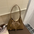 Chic brown leather shoulder bag with decorative wooden beads and dual straps design - Brown with Pendant
