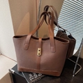 Dark brown pebbled leather tote bag with gold metal buckle and reinforced corners - Coffee