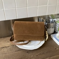 Minimalist caramel brown frosted faux suede crossbody bag with beaded pendant - Brown with Pendant