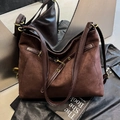 Retro dark brown large suede tote bag with metal eyelets and adjustable strap - Brown