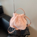 Chic light pink plush drawstring bucket bag with faux fur finish and leather strap - Pink