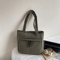 Dark green quilted nylon tote bag with wide shoulder straps and front zipper pocket - Green