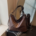 Deep caramel brown hobo shoulder bag with functional diagonal metal zipper detail - Coffee
