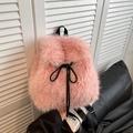 Plush pink faux fur backpack with black drawstring closure and stylish design - Pink