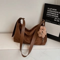 Brown faux suede hobo bag with teddy bear pendant and adjustable shoulder strap - Deep Brown With Charm