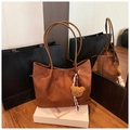 Caramel brown suede tote bag with plush bear charm and long leather handles - Brown with Pendant