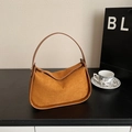 Brown faux suede hobo bag with a minimalist half-moon shape and shoulder strap - Brown