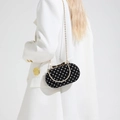 Chic black velvet polka dot mini evening bag with gold chain strap and bow clasp - Black