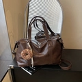 Large dark coffee PU leather Boston tote bag with plush donut charm and shoulder strap - Coffee with Pendant
