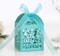 Detailed laser-cut lace floral pattern on Tiffany blue gift box with elegant ribbon bow - Tiffany Blue