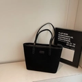 Minimalist black matte tote bag with dual shoulder straps and spacious interior design - Black without Pendant