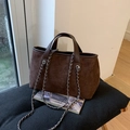 Dark brown faux suede bucket bag with stylish silver chain strap and leather handle - Brown