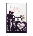 Detailed laser-cut wedding invitation featuring Mr & Mrs silhouettes and floral inserts - Black