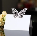 Elegant white laser-cut butterfly place card for wedding tables and formal seating - White