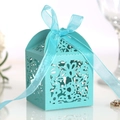 Laser-cut Tiffany blue wedding favor box with floral hollow patterns and satin ribbon bow - Teal Blue