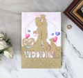 Dettaglio decorazione nuziale oro glitter con silhouette di coppia e cagnolino - Giallo Oro Scintillante