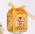 Elegant gold laser-cut lace candy box with matching ribbon for wedding and party favors - Gold