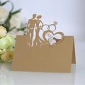 Laser cut kraft paper wedding place card with Mr & Mrs heart silhouette and bride groom detail - Beige Gold