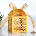 Detailed laser-cut European floral patterns on a gold pearlescent paper wedding gift box - Gold