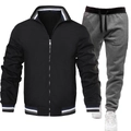 Detail eines Herren-Freizeitanzugs mit schwarzer Stehkragenjacke und grauer Jogginghose - Schwarzes Oberteil Mit Dunkelgrauer Hose