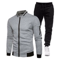 Detalle de chaqueta gris acolchada con puños de canalé y pantalones negros con cordón - S / Top Y Pantalón / Gris claro